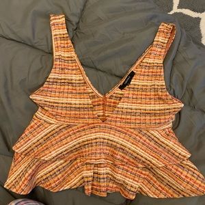 Small, low cut flowy shirt